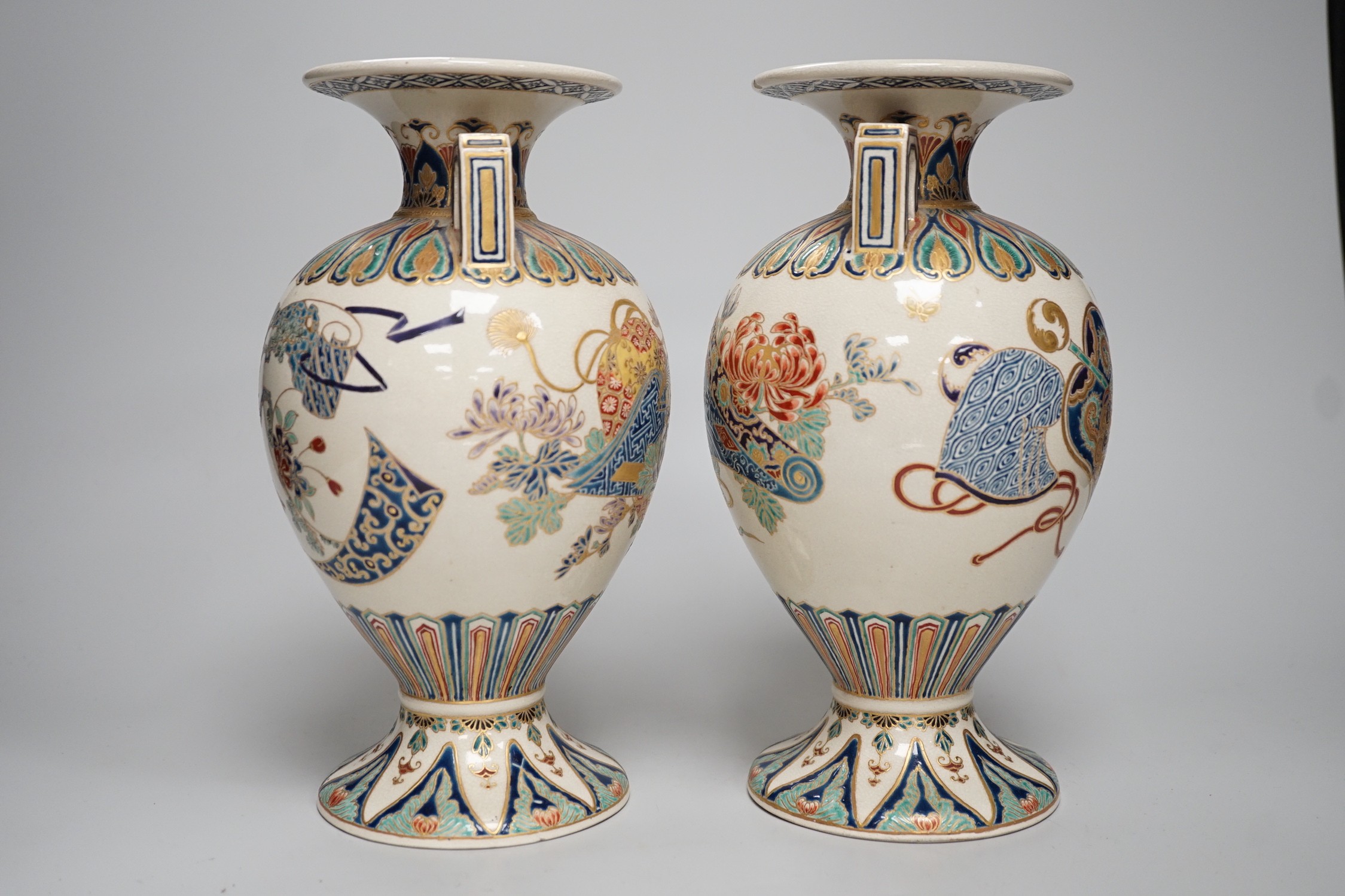 A pair of Japanese Satsuma gosu blue vases, Meiji period, signed to base. 24cm